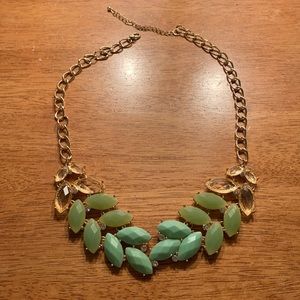 Green lean motif statement necklace